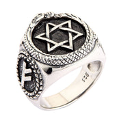 An angled view of the men's sterling silver Star of David alchemist signet ring.