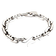 A heavy sterling silver bike chain bracelet with a secure S-hook clasp, shown on a clean white background.