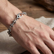 Lifestyle shot of sterling silver bracelet on wrist showing 7mm width
