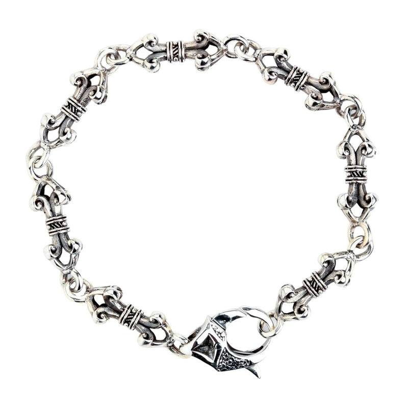 Vue complète du bracelet dorje en argent sterling montrant le motif complexe des maillons