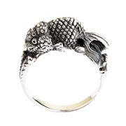 A sterling silver goldfish ring in a Japanese style, showing detailed scales and an oxidized finish.