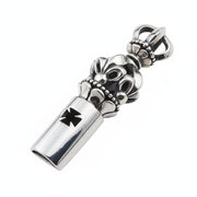 A handcrafted sterling silver medieval whistle pendant with a gothic crown top and an iron cross cutout, shown at an angle.