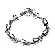 A solid sterling silver motorcycle piston bracelet with detailed, articulated links and a secure T-bar toggle clasp.