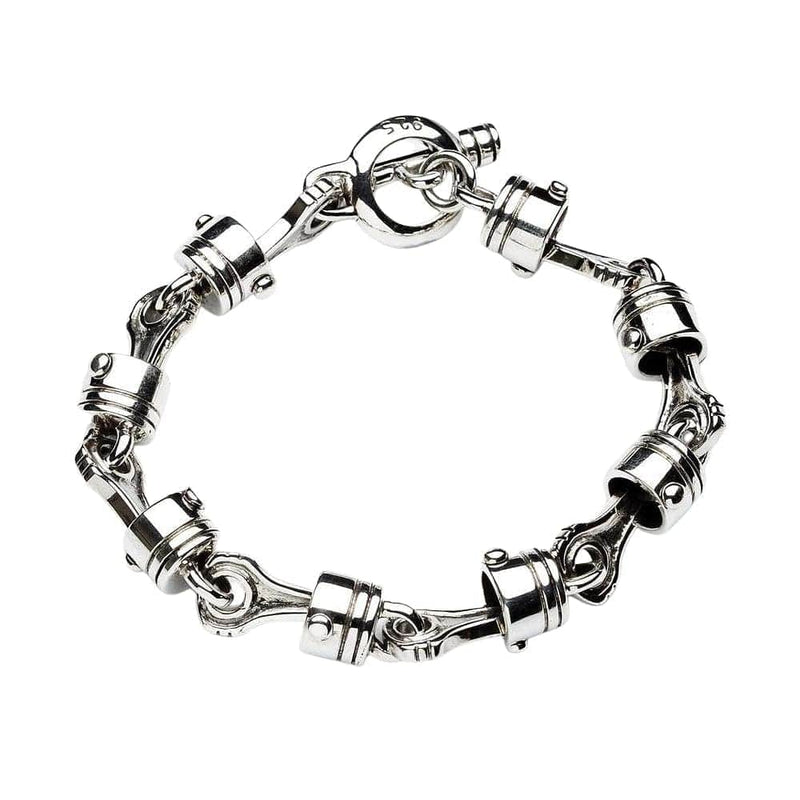 Bracelet de moto à piston en argent massif avec des maillons détaillés et articulés et un fermoir à bascule sécurisé.