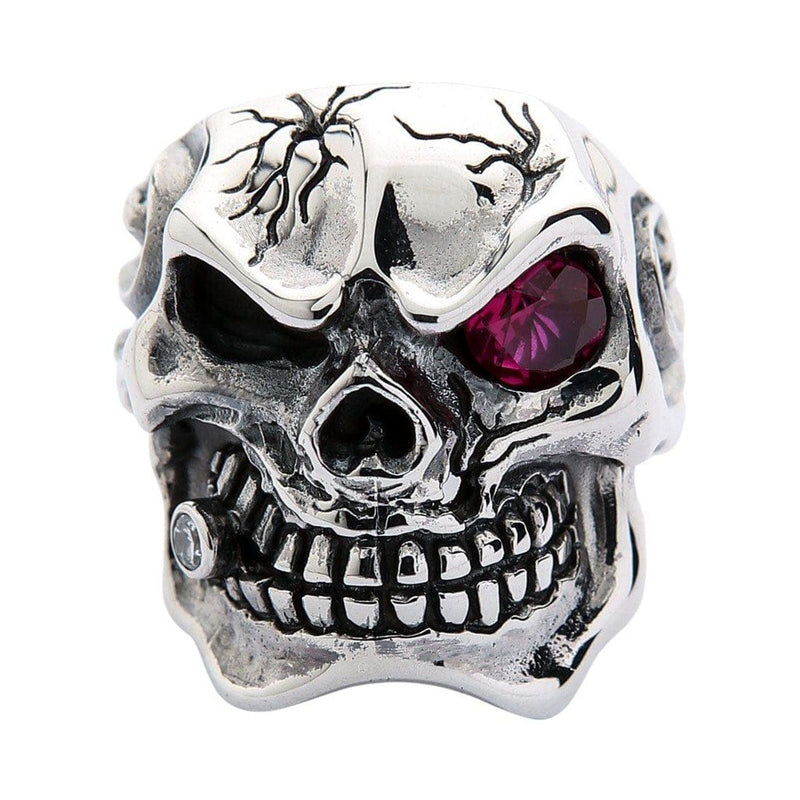 Anillo de calavera Mafia con ojo rojo rubí y cigarro en plata de ley, vista frontal con detalles de calavera agrietada.