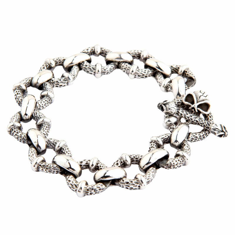 Full view of heavy sterling silver biker bracelet with textured links and skull clasp on white background.