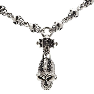 Sterling silver skull chain necklace with black stone mohawk skull pendant close-up front view