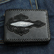 Close up of black stingray leather wallet with white gothic cross inlay