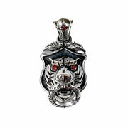 Front view of the solid 925 sterling silver tiger knocker pendant with red eyes.