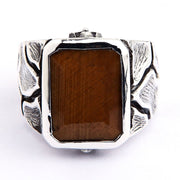 Front view of Tiger's Eye men's ring in 925 sterling silver with rectangular gemstone and cracked earth pattern