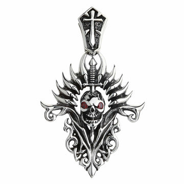 Tribal blade skull pendant in .925 sterling silver with red stone eyes and a dagger driven down through the skull.
