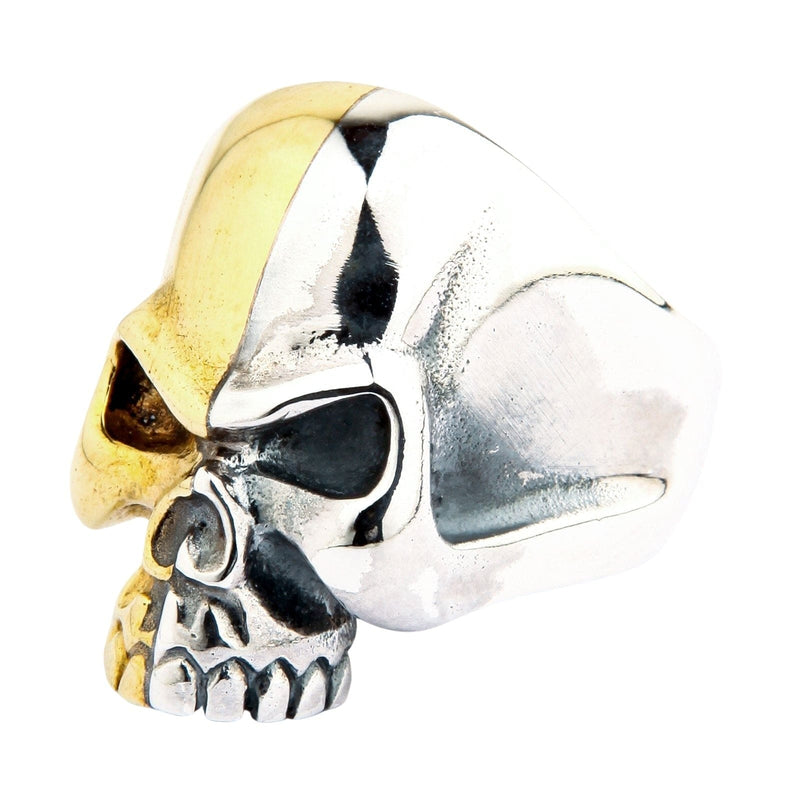 Angled view of the Two-Tone Rider Biker Ring showing the brass forehead and sterling silver jaw and band.