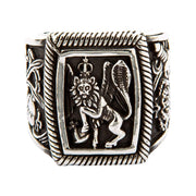 A solid sterling silver winged lion of St. Mark ring with a detailed crowned lion and ornate side details.