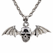 A front view of the winged skull necklace, highlighting the double skull design with the smaller skull on the bail.