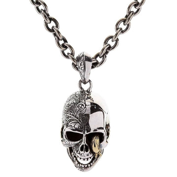 Front view of the complete worm skull necklace, showing the two-tone silver and brass pendant on a sturdy sterling silver chain.
