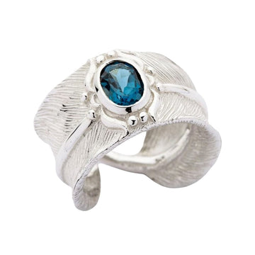 Anello in argento sterling con piuma in topazio blu