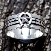Front view of the 925 silver horseshoe star band ring showing the star motif.