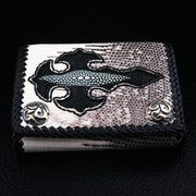 Front view of handcrafted biker wallet made from white lizard skin with a black stingray cross inlay.