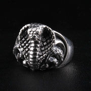 A side profile of the men's coiled cobra ring, showing its polished silver band and 3D design.