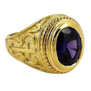 An ornate gold cross bishop ring for men, featuring a central amethyst and detailed scrollwork on the band.