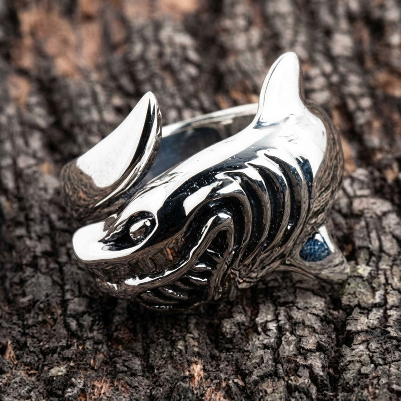 A front view of the sterling silver shark wrap ring, showing the detailed head and tail fin.