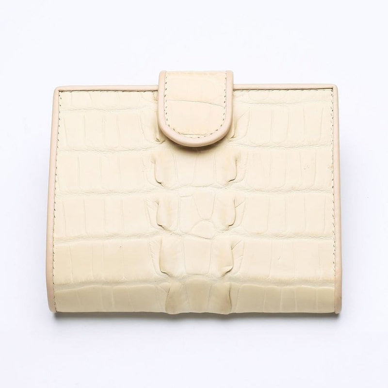 Front view of luxury women's wallet made from genuine white pearl crocodile leather.