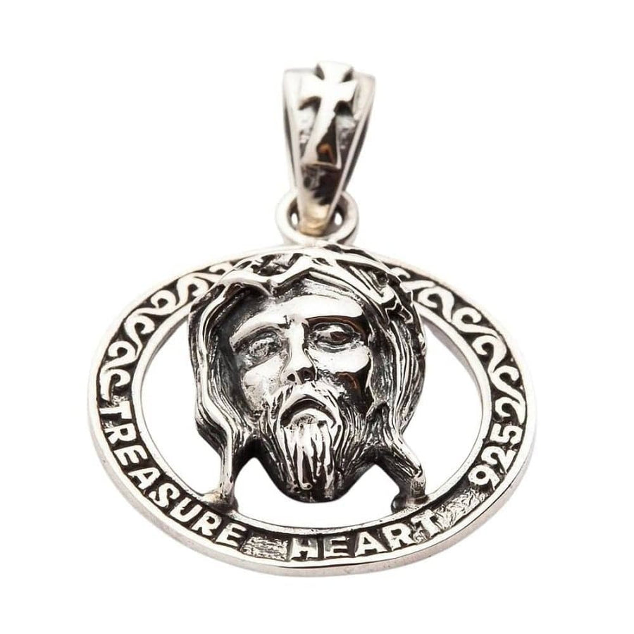 Set forfra af Jesus Kristus-vedhæng i 925 sterlingsølv med tornekrone indeni en cirkulær ramme.