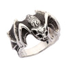 Three-quarter angle on the sterling silver bat, wings spread across the top and oxidized recesses darkening the body