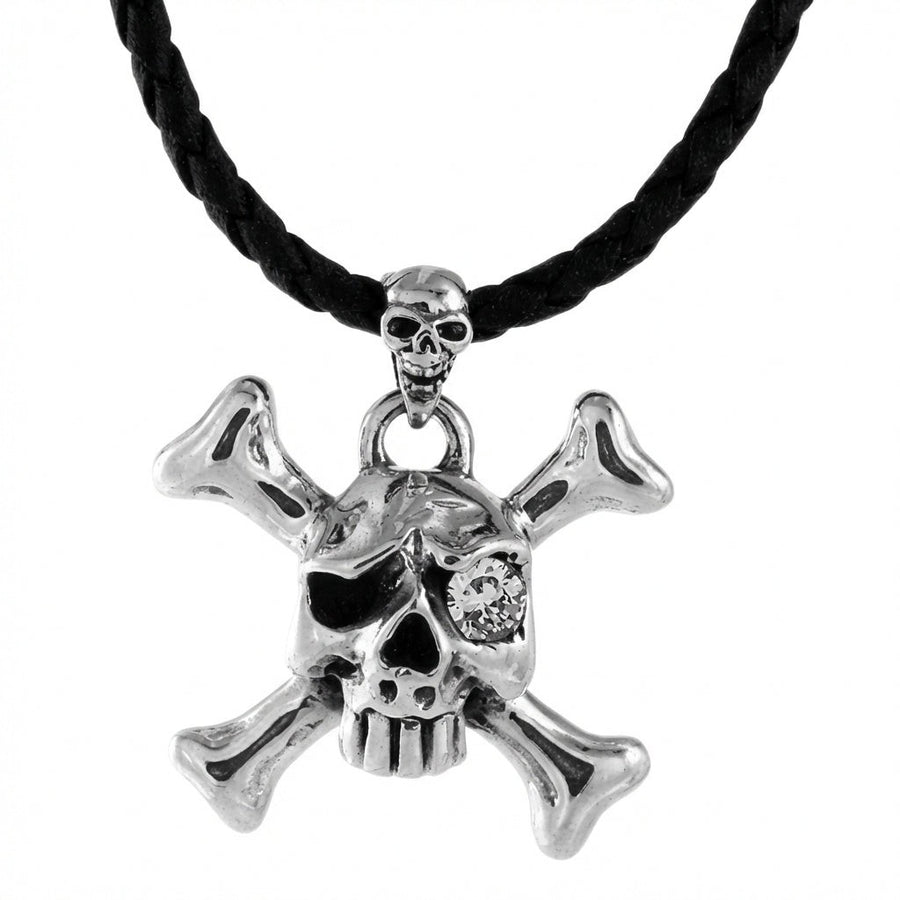 Colgante de calavera con diamante en el ojo y cruz de huesos en plata esterlina con piedra CZ en la cavidad ocular vista frontal