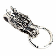 A front view of the heavy sterling silver Eastern dragon guardian pendant with detailed scales.
