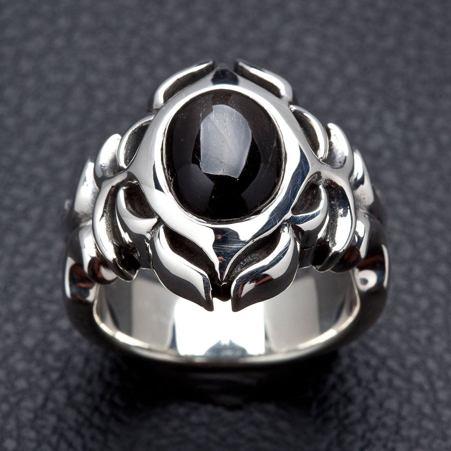 Front face of the Tribal Black Onyx ring showing the oval cabochon stone framed by polished sterling silver tribal carving