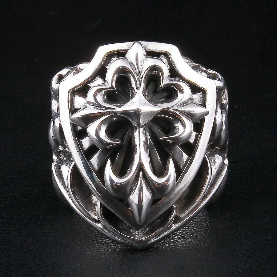 Front view of ornate gothic cross sterling silver shield ring showing 3D relief details