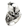 A closed view of a gothic skull locket ring, showing the intricate skull and crossbones engravings on the side.