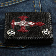 A front view of the gothic biker wallet with a red stingray cross, black braided edge, and silver snaps.