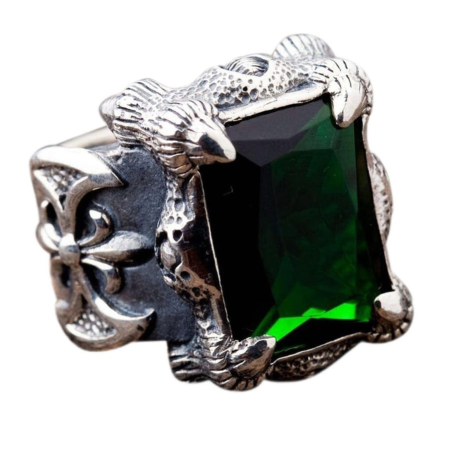 En solid sterling silver grøn drageklo ring med en stor emeraldgrøn sten holdt af detaljerede kloer.