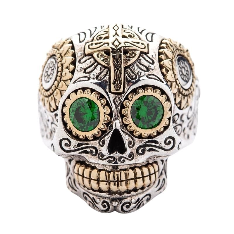 An anillo de azúcar de plata esterlina con ojos de CZ verde brillante y detalles de latón dorado.