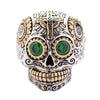 An anillo de azúcar de plata esterlina con ojos de CZ verde brillante y detalles de latón dorado.