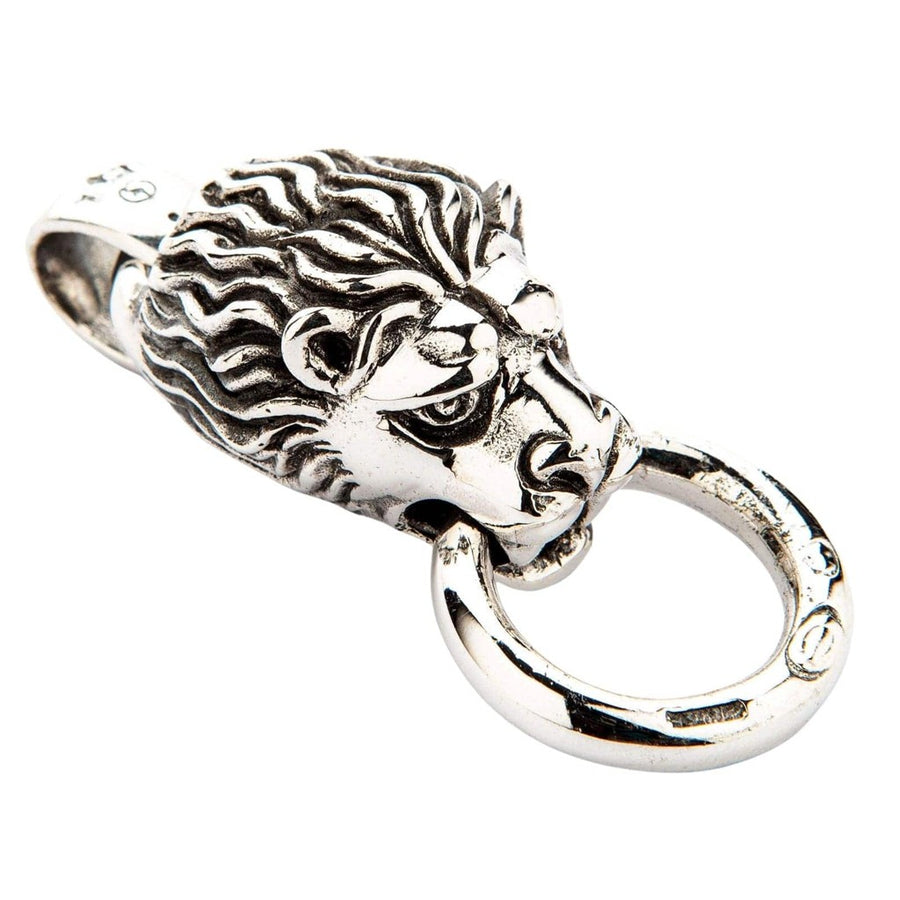 Handcrafted sterling silver lion head pendant angled view on white background