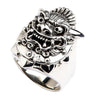 Oxidized sterling silver Hannya mask ring with snarling fangs, hollow eyes, and ornate horned detail on wide band