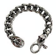 A massive 162-gram heavy garnet eye skull bracelet in solid 925 sterling silver.