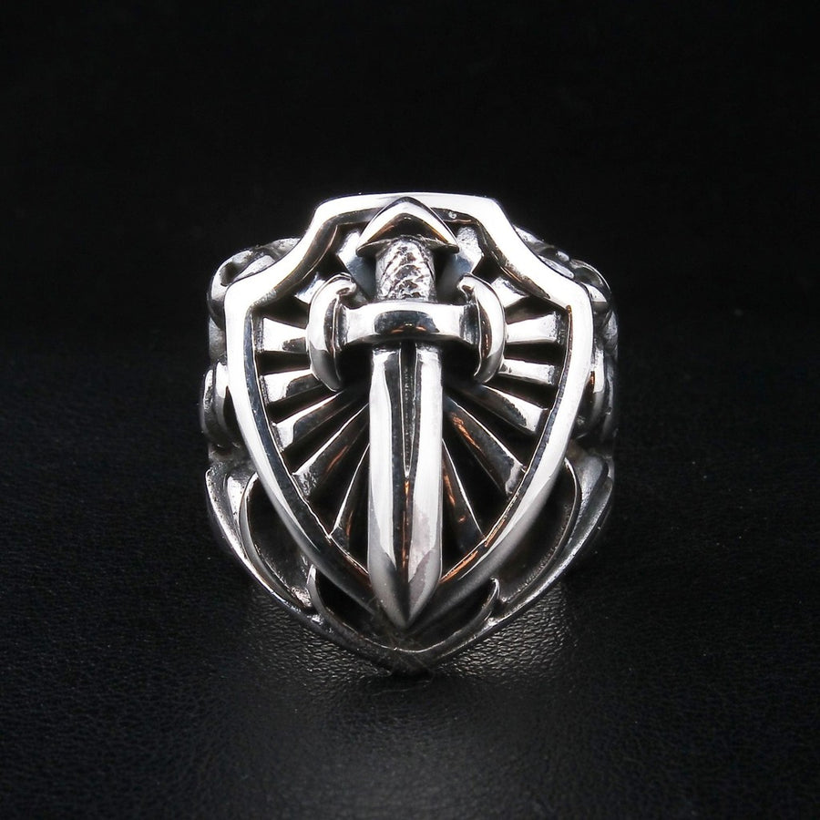 Front view of solid silver heater shield ring with sword emblem