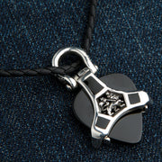 The men's Lion of Judah pick holder shown on a sterling silver chain as a complete reggae-style necklace.