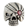 Front view of the Pirate Sterling Silver Skull Ring showcasing mismatched red garnet and clear CZ eyes.