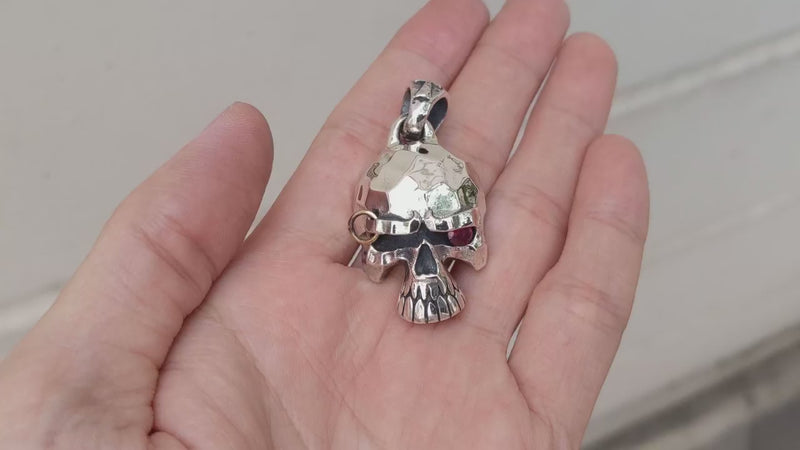 Pierced Skull Pendant with a Ruby CZ Eye Glare