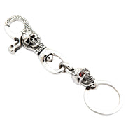 Solid 925 silver biker keychain with a red garnet eye skull.