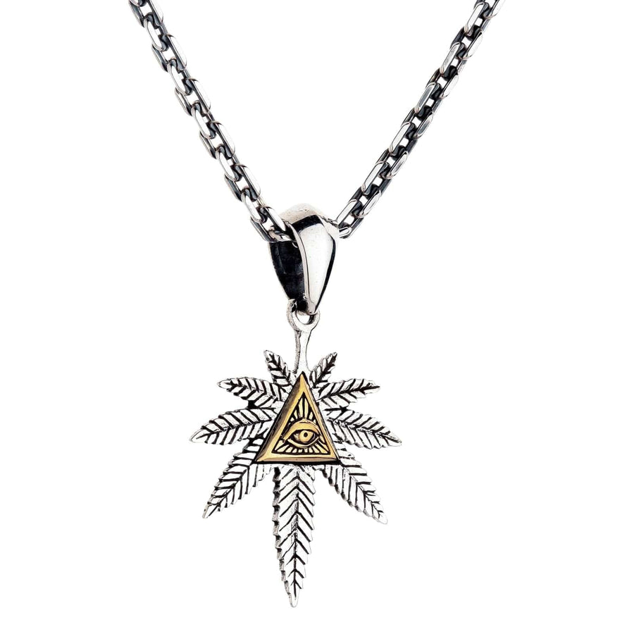 Az Illuminati kannabisz medál ezüst nyakláncon, hogy látszódjon, hogyan lóg.
