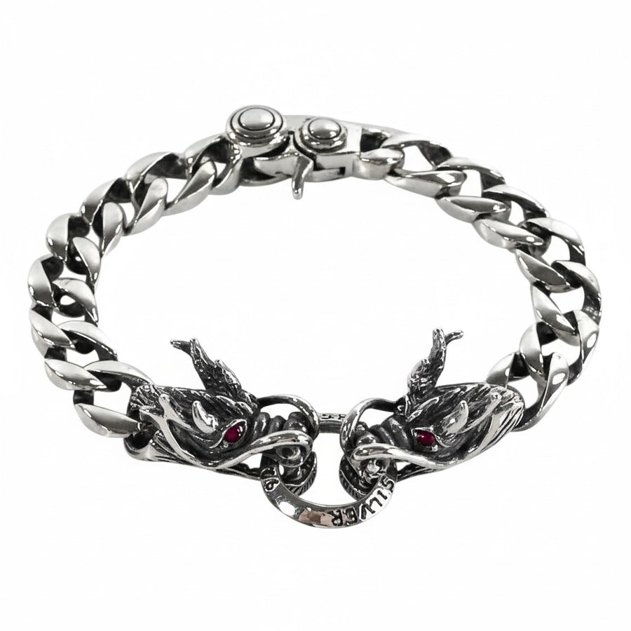 Un brazalete de plata esterlina sólida para hombre con una cadena de eslabones cubanos de 12 mm y un broche de doble cabeza de dragón.