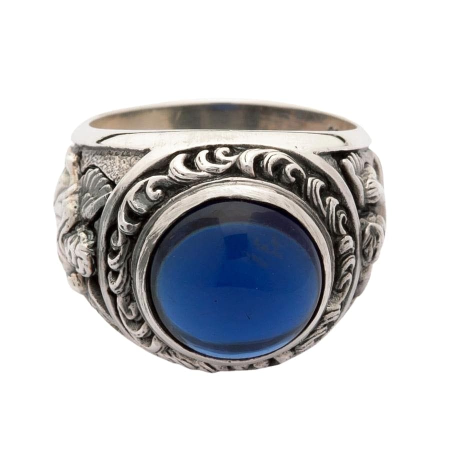 Front view of Sterling Silver Cupid Ring featuring large blue stone