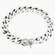 Full view of the 10mm sterling silver curb chain bracelet with high polish finish.