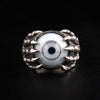 Sterling silver eyeball ring with skeleton claw design front view showing gray acrylic eye gripped by detailed bone fingers